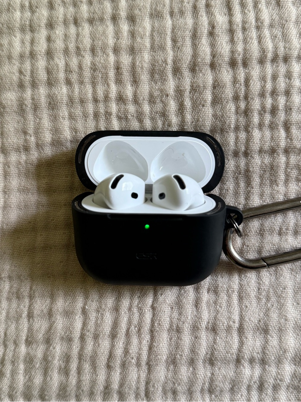Apple AirPods with Black Charging Case and White Earbuds